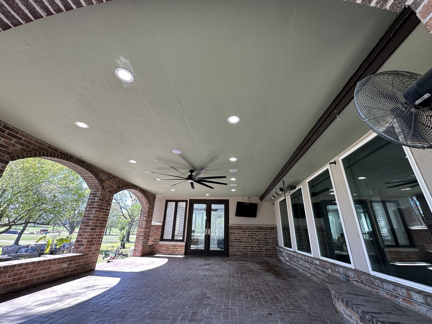 Custom covered patio with brick archways