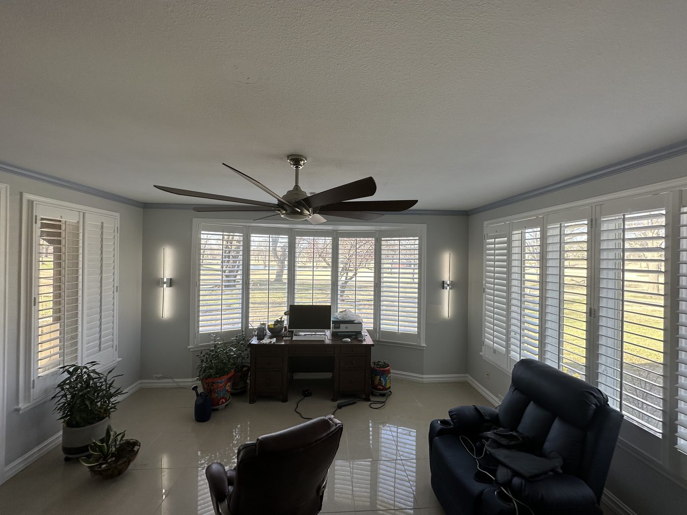 Finished sunroom with bay windows