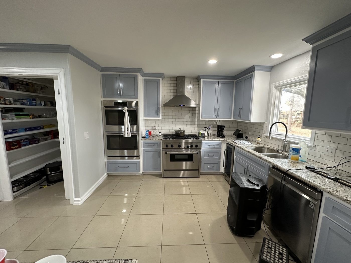 Custom kitchen remodel with blue cabinetry